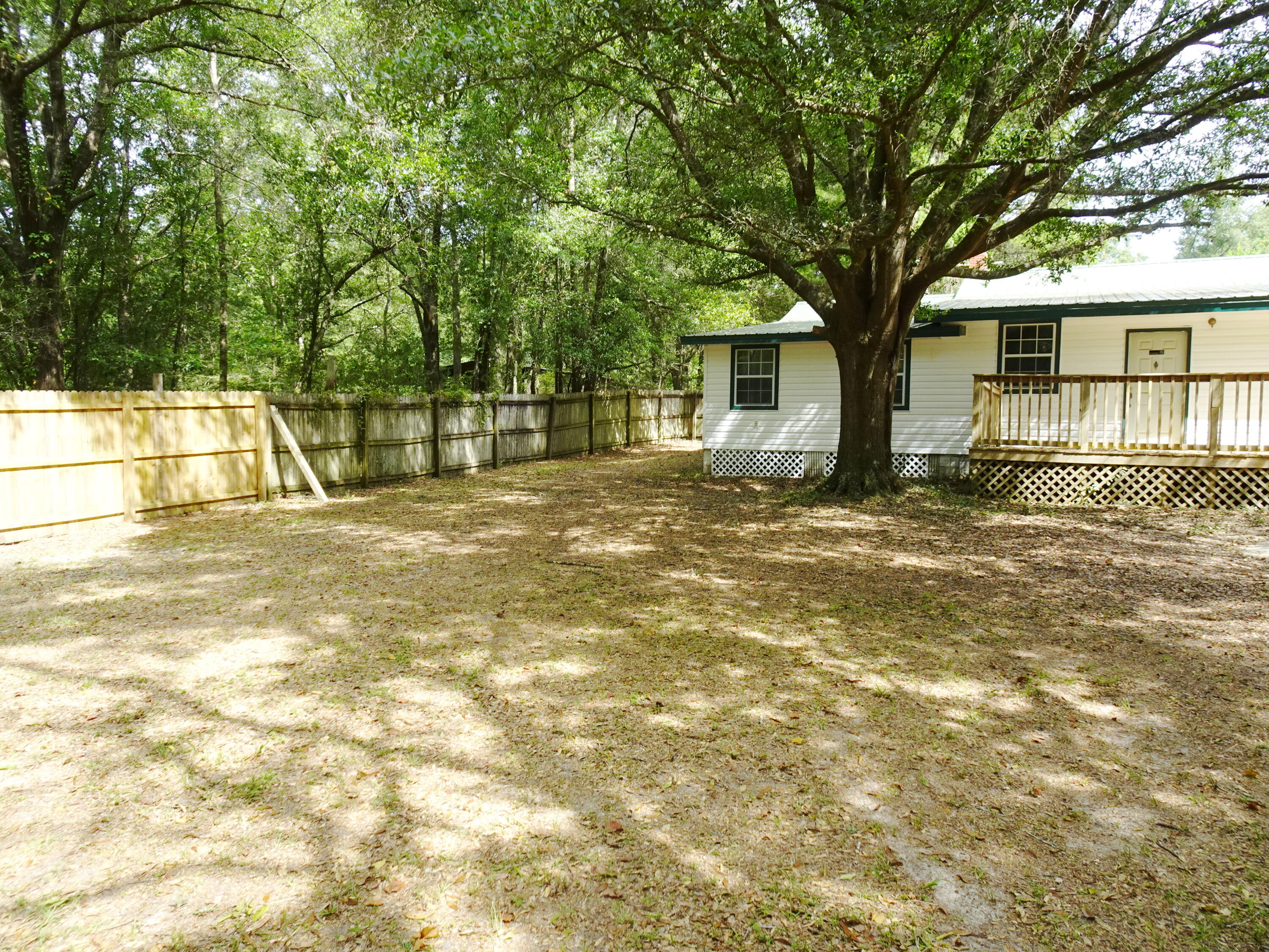 195 Heather Lane DeFuniak Springs, FL 32433 - Photo 18 of 20 a view of a house with a outdoor space