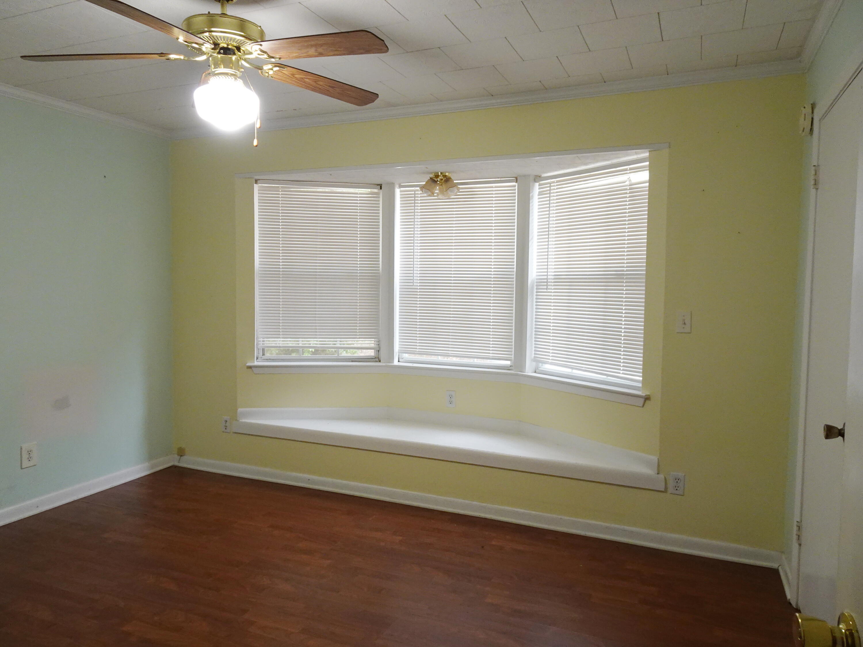 195 Heather Lane DeFuniak Springs, FL 32433 - Photo 8 of 20 a view of an empty room with a window