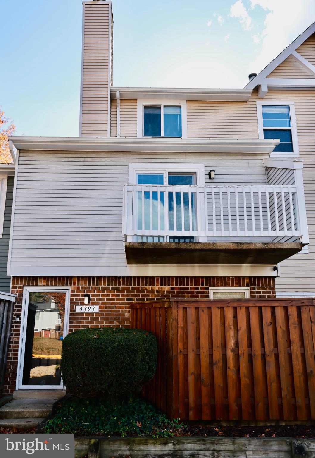 4393 Pembrook Village Drive, Unit 84 Alexandria, VA 22309 - Photo 1 of 38 a view of a house with backyard and deck