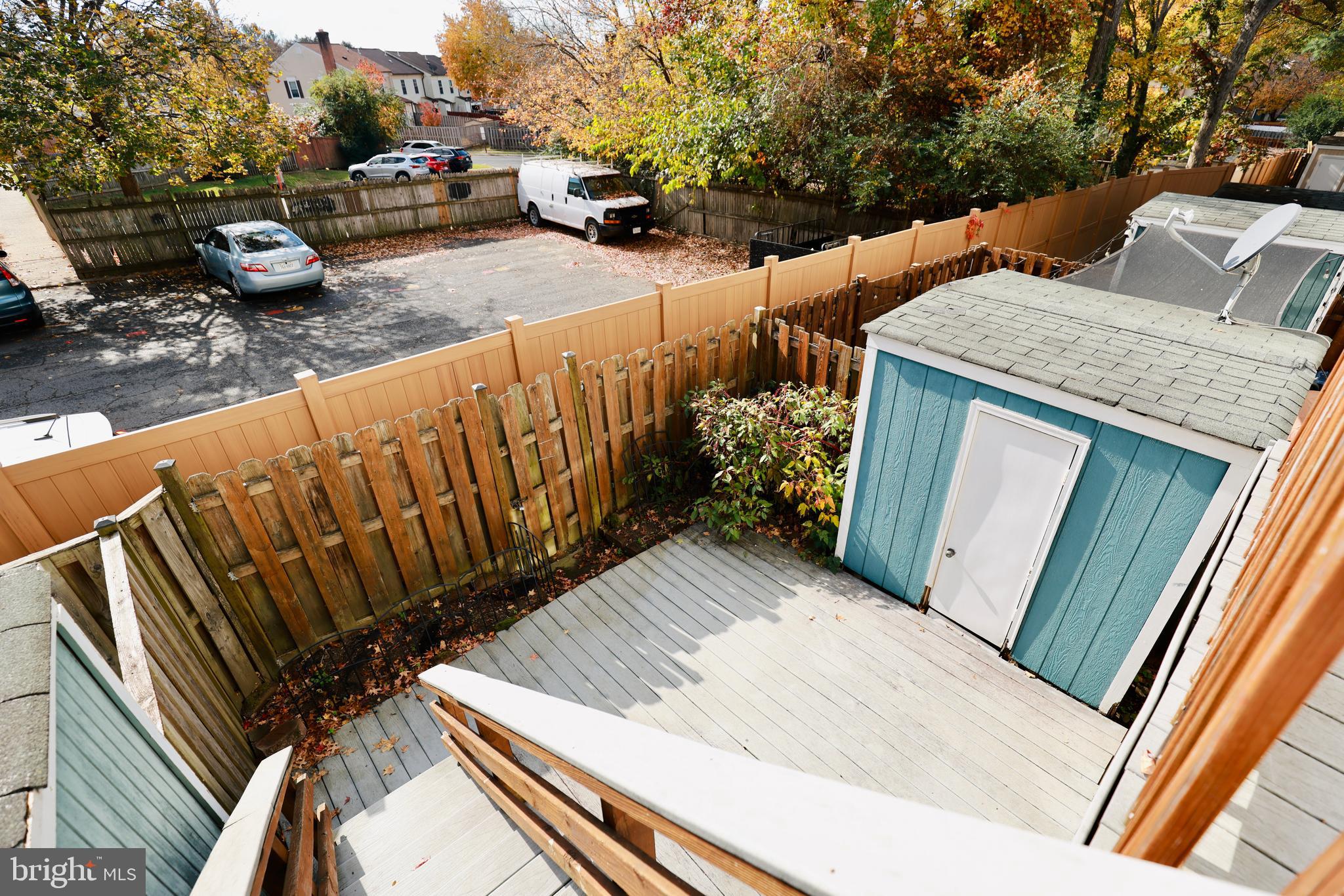 4393 Pembrook Village Drive, Unit 84 Alexandria, VA 22309 - Photo 36 of 38 a view of deck and patio