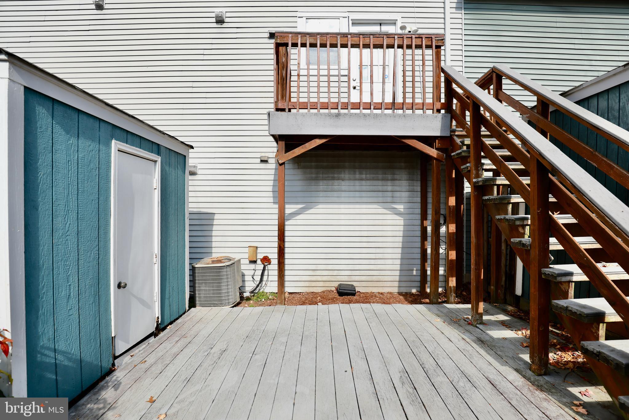 4393 Pembrook Village Drive, Unit 84 Alexandria, VA 22309 - Photo 38 of 38 a view of a house with a deck