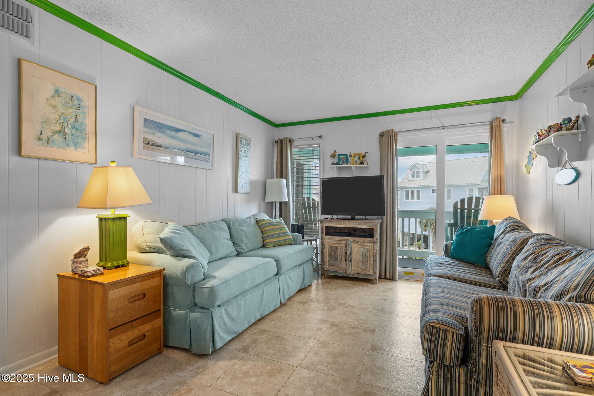 301 Commerce Way, Unit 258 Atlantic Beach, NC 28512 - Photo 6 of 26 Living Room w Balcony Access