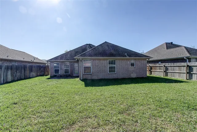 a view of a yard in front of a house