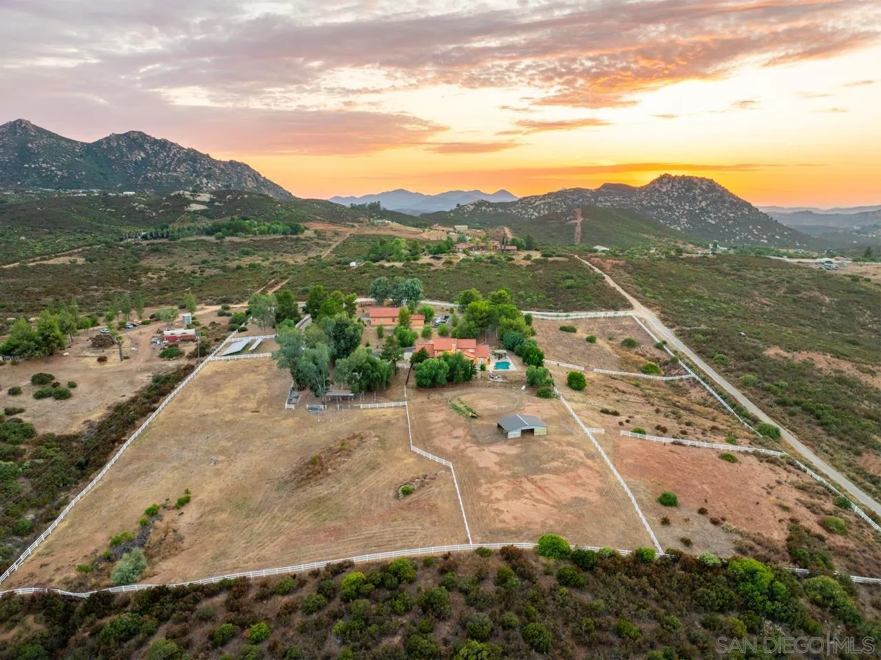 15091 Chemise Creek Road Ramona, CA 92065 - Photo 6 of 74 a view of a lake with mountains in the background