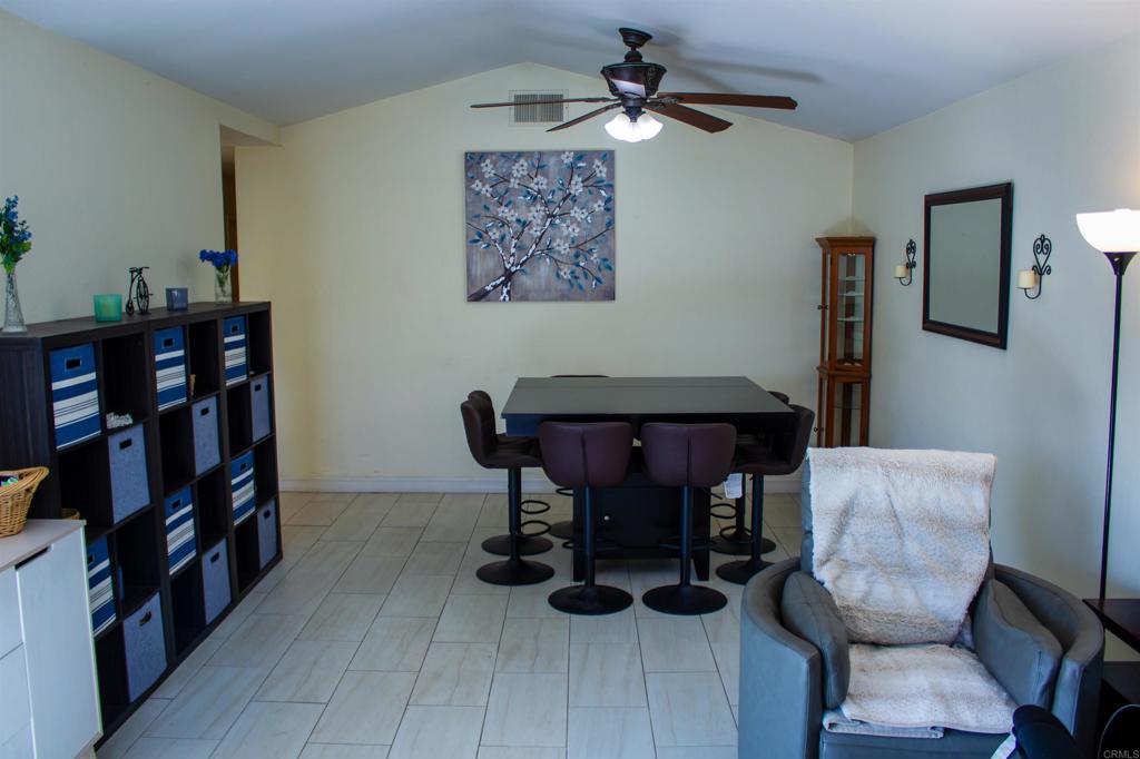10385 Seth Way Santee, CA 92071 - Photo 16 of 33 a dining room with furniture and wooden floor