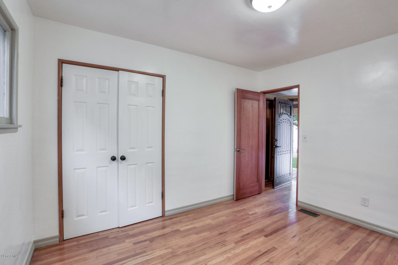 4259 Adam Road Simi Valley, CA 93063 - Photo 14 of 35 an empty room with wooden floor and closet