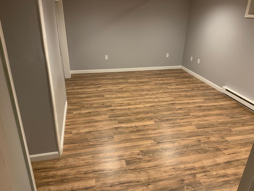 30 Dunns Pond Road Hyannis, MA 02601 - Photo 25 of 33 a view of an empty room with wooden floor