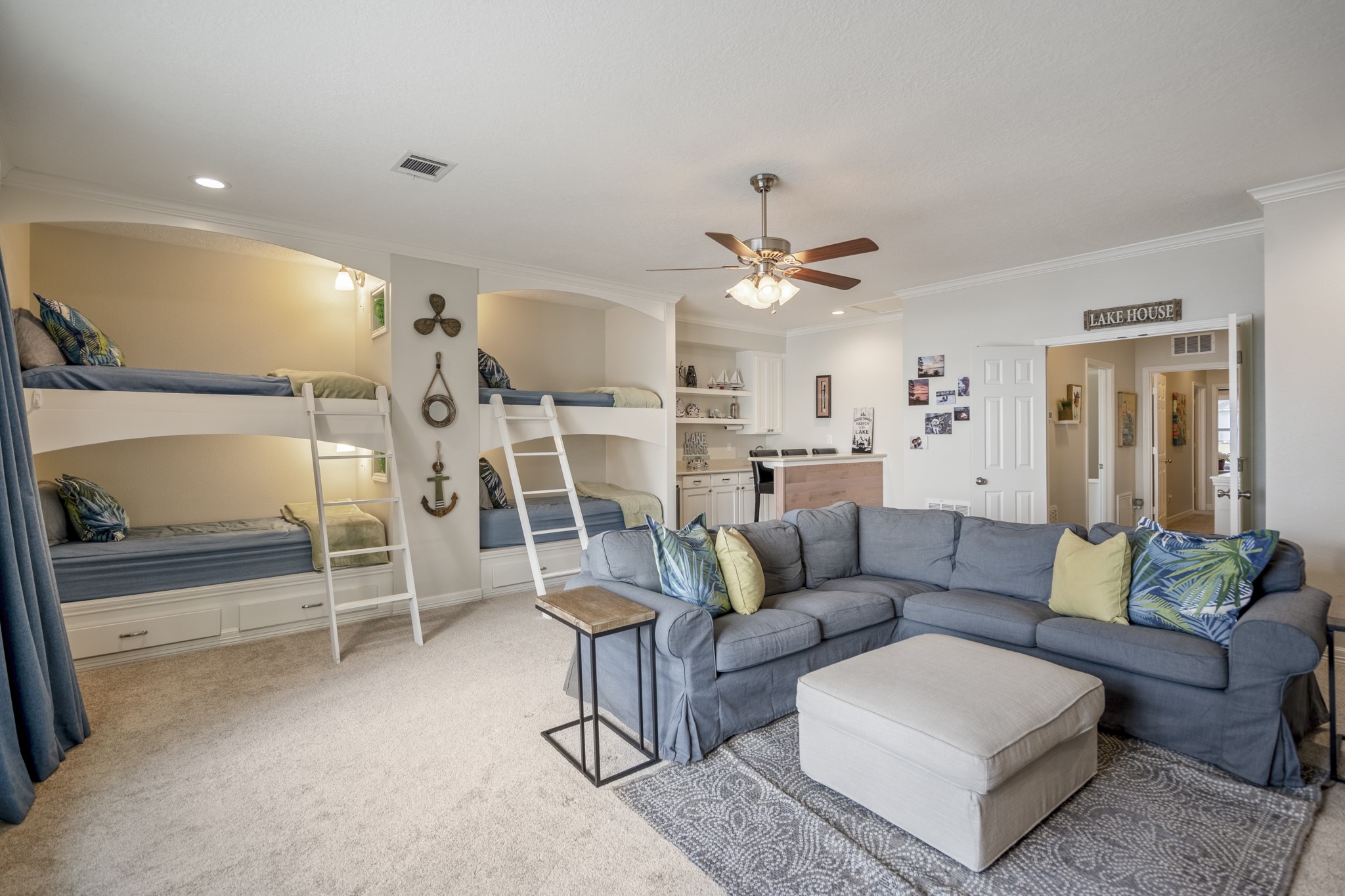 615 Inlet Drive Livingston, TX 77351 - Photo 31 of 50 The game room offers built in bunks and space to entertain and relax after a day on the lake!