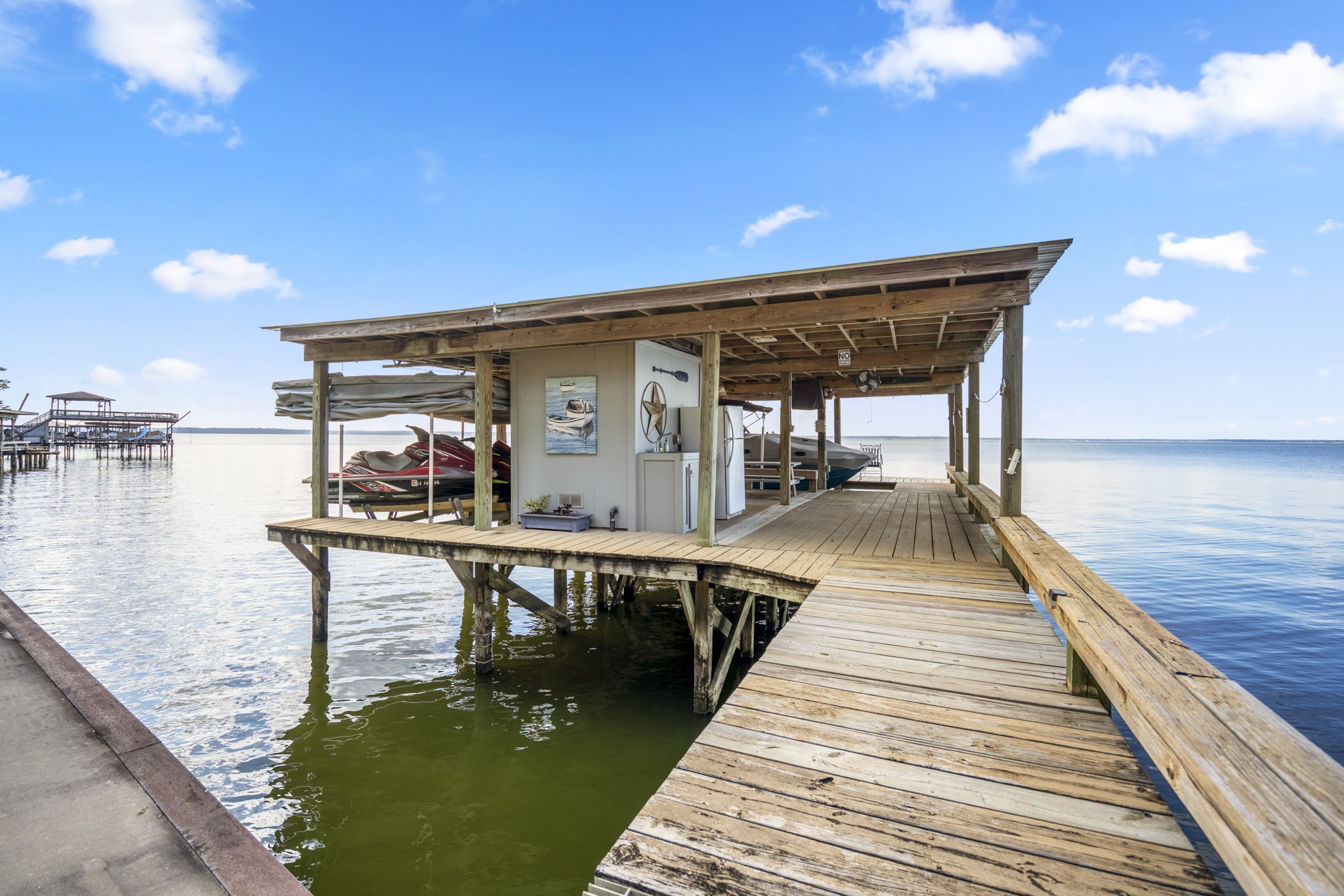 615 Inlet Drive Livingston, TX 77351 - Photo 43 of 50 This expansive dock offers so much to enjoy!