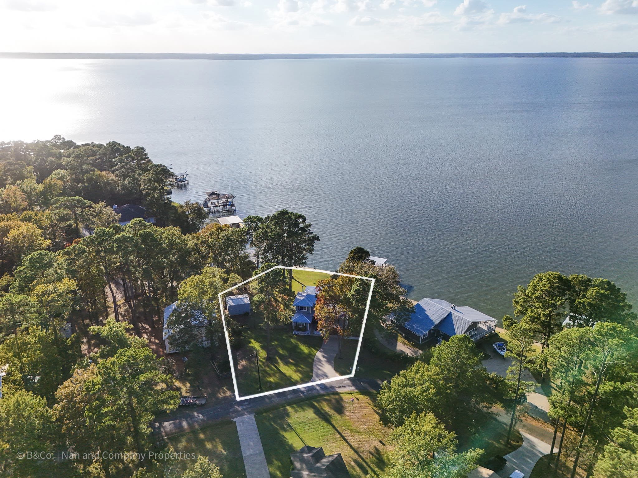 615 Inlet Drive Livingston, TX 77351 - Photo 49 of 50 The property sits on a 19,858 sqft wooded waterfront lot with amazing views, stunning sunsets and deep water!