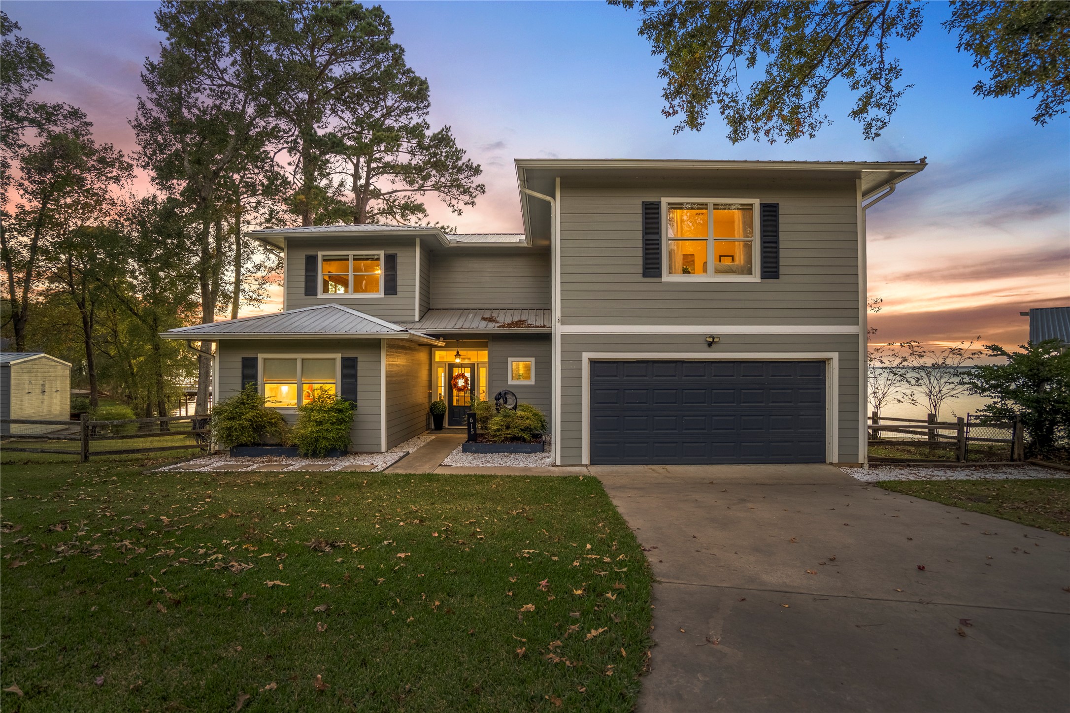 615 Inlet Drive Livingston, TX 77351 - Photo 6 of 50 a front view of a house with a yard