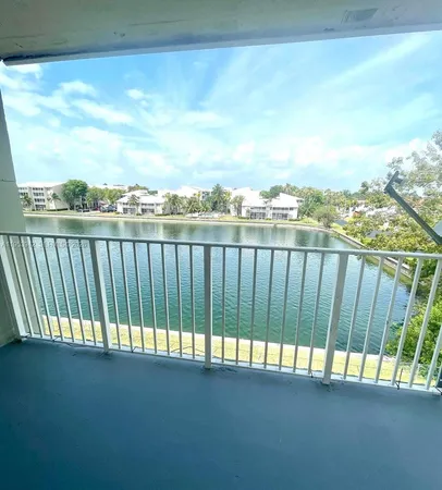 a view of balcony with furniture