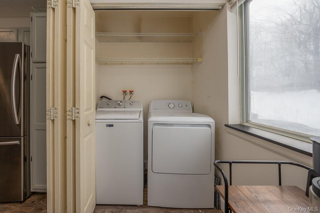 1406 Eagles Ridge Road Brewster, NY 10509 - Photo 12 of 23 a utility room with dryer and washer
