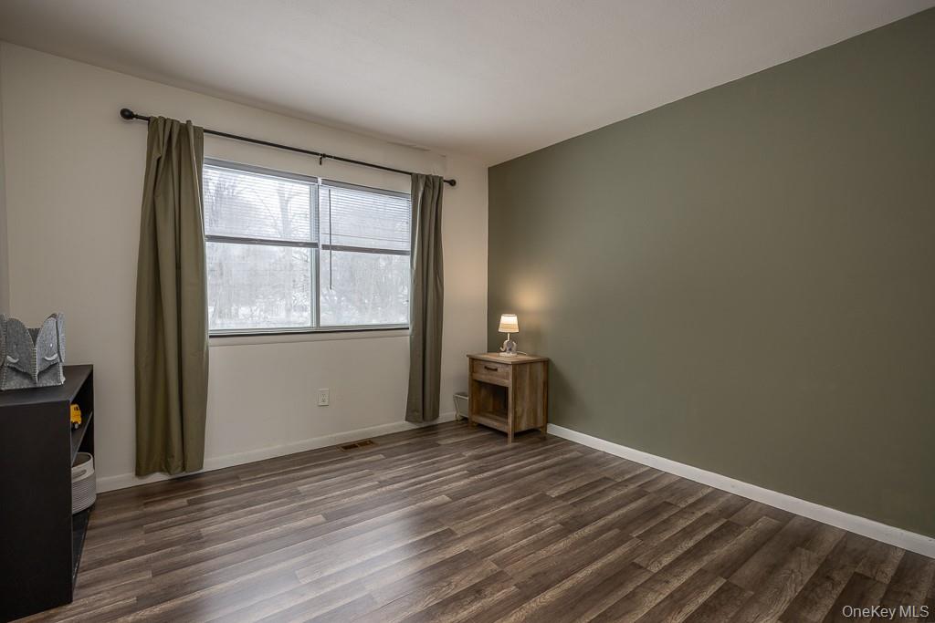 1406 Eagles Ridge Road Brewster, NY 10509 - Photo 17 of 23 wooden floor and windows in a room