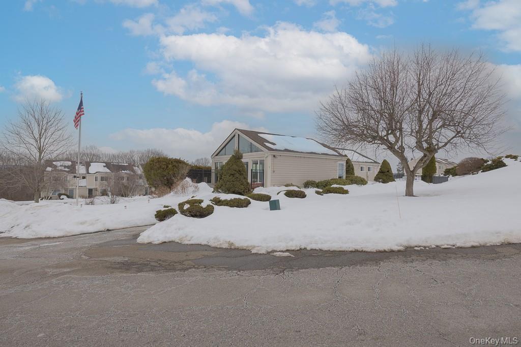 1406 Eagles Ridge Road Brewster, NY 10509 - Photo 20 of 23 a view of a road with snow on the road