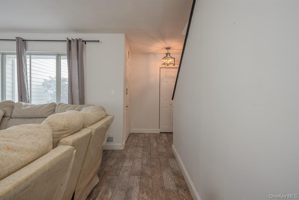 1406 Eagles Ridge Road Brewster, NY 10509 - Photo 2 of 23 a living room with furniture and a window