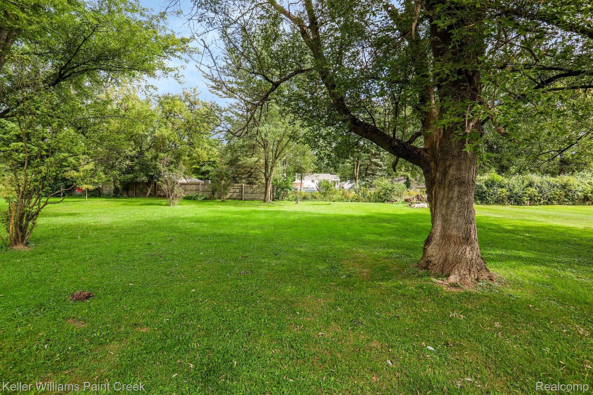 3201 Grant Road Rochester, MI 48309 - Photo 14 of 16 Spacious backyard with mature landscaping and good shade.