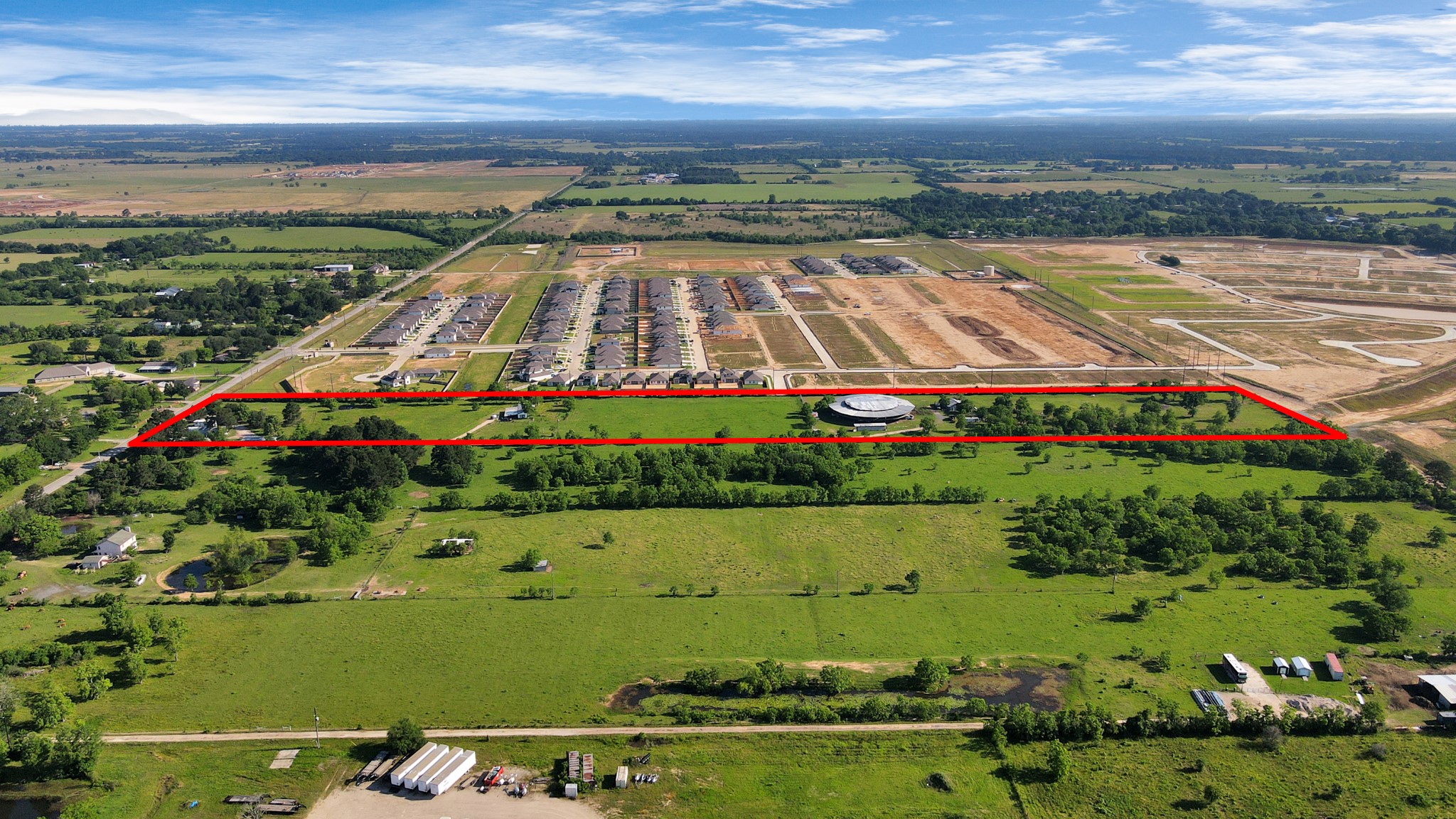 21512 Binford Road Waller, TX 77484 - Photo 32 of 50 a view of a lake with a houses