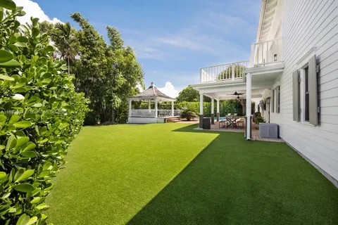 a view of outdoor space yard deck patio and swimming pool