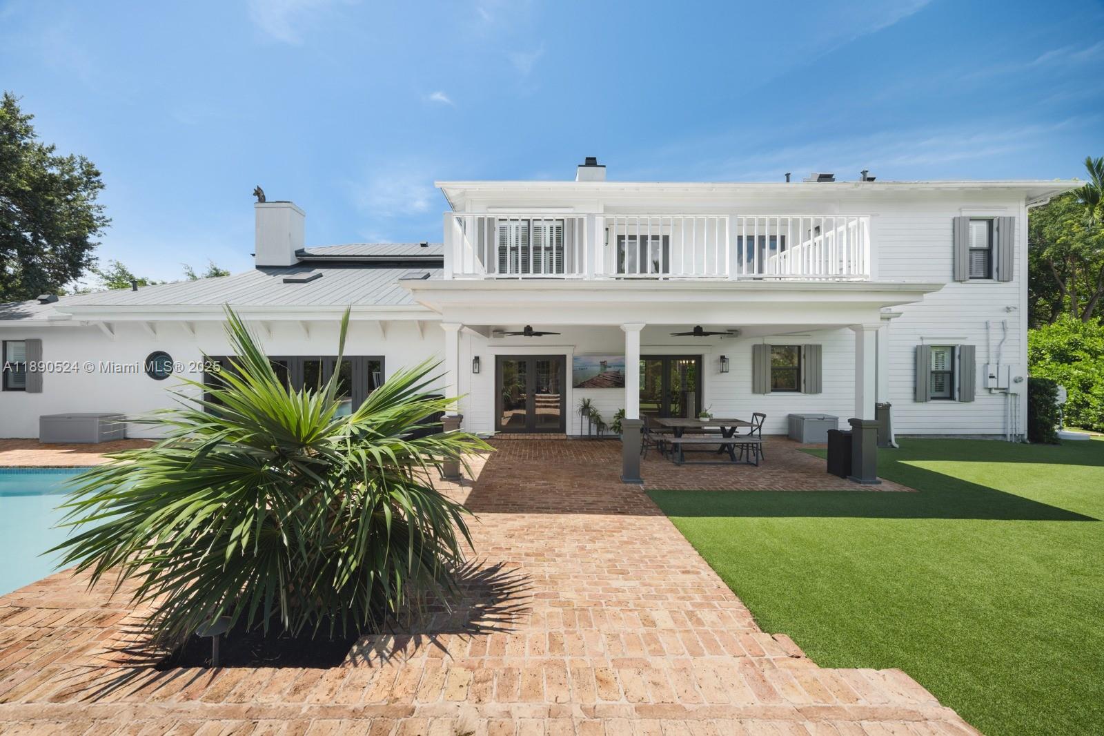 8521 Southwest 145th Street Palmetto Bay, FL 33158 - Photo 26 of 27 a house view with a garden space
