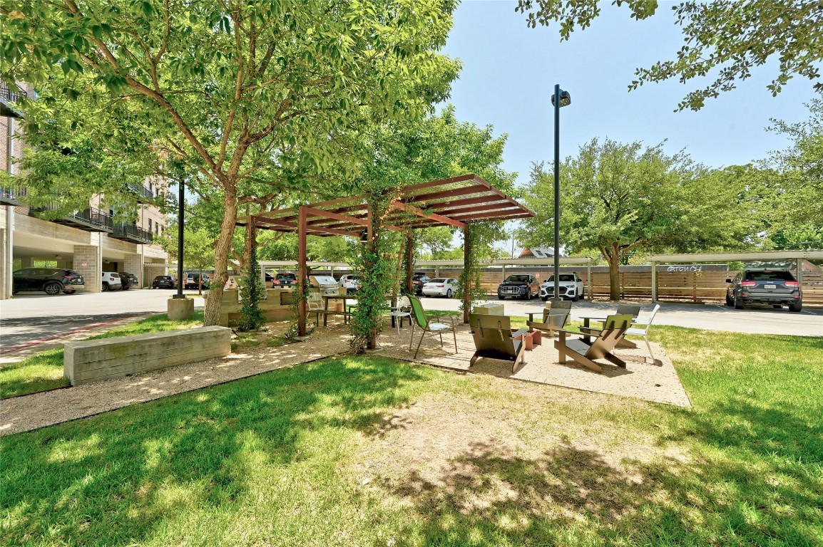 2235 East 6th Street, Unit 402 Austin, TX 78702 - Photo 17 of 30 a view of a swimming pool with a patio
