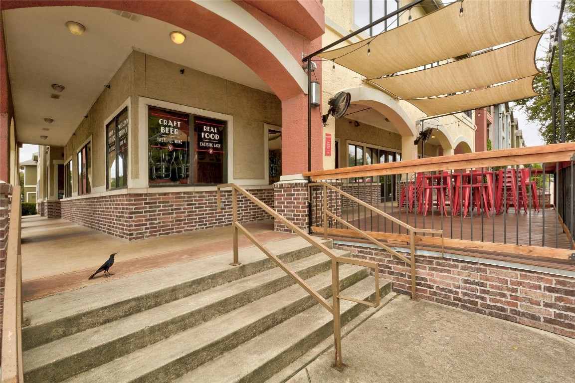 2235 East 6th Street, Unit 402 Austin, TX 78702 - Photo 25 of 30 a view of a house with a porch