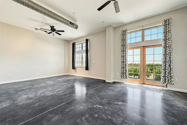 an empty room with windows
