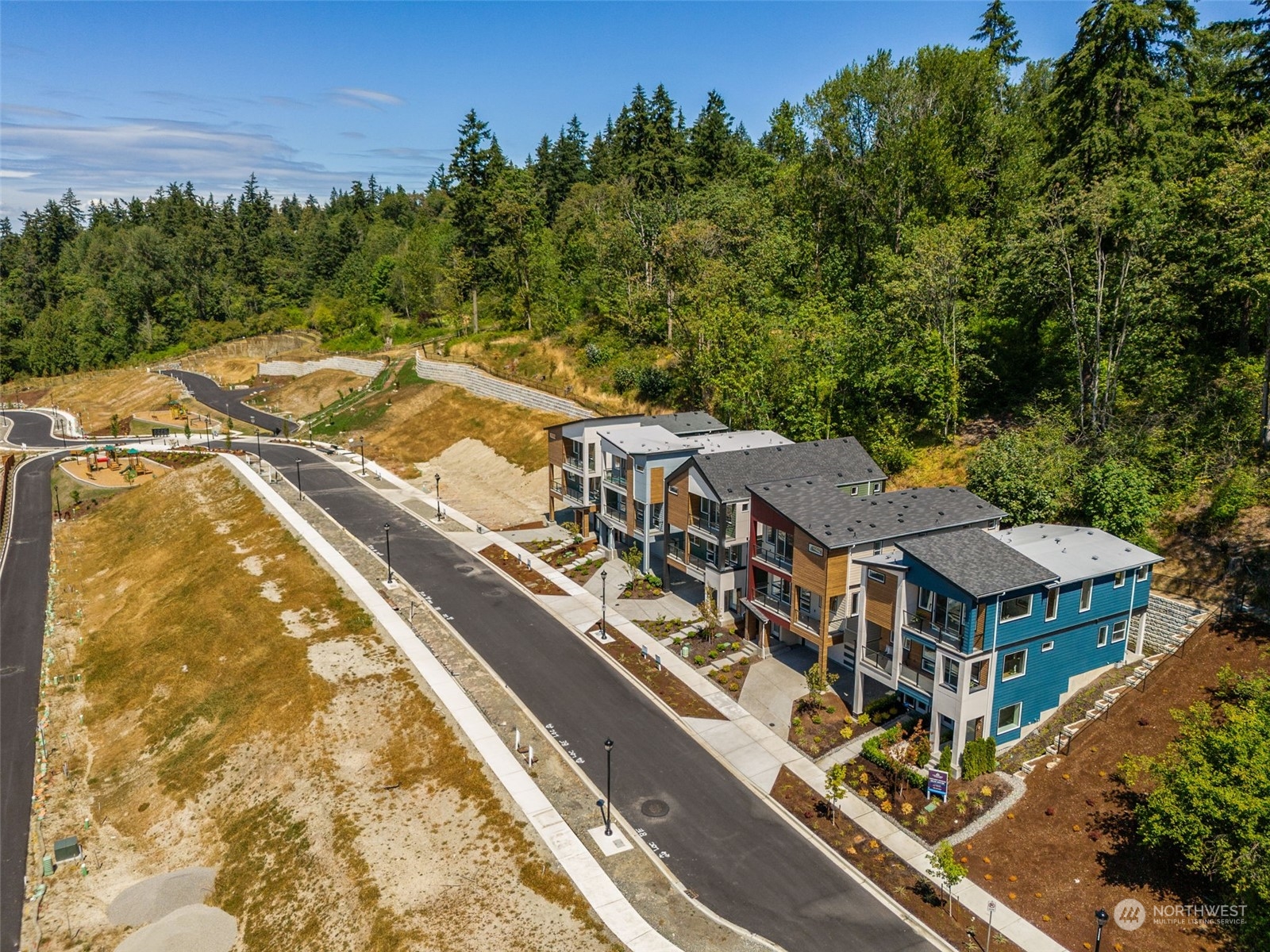 4034 Aberdeen Way Northeast, Unit 35 Renton, WA 98056 - Photo 27 of 32 a view of a house with a yard