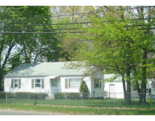1360 Wilbraham Road Springfield, MA 01119 - Photo 1 of 1 a front view of a house with garden