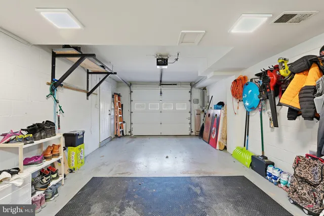 a view of a garage with a lot of stuff and toys