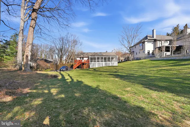 a view of a house with a big yard