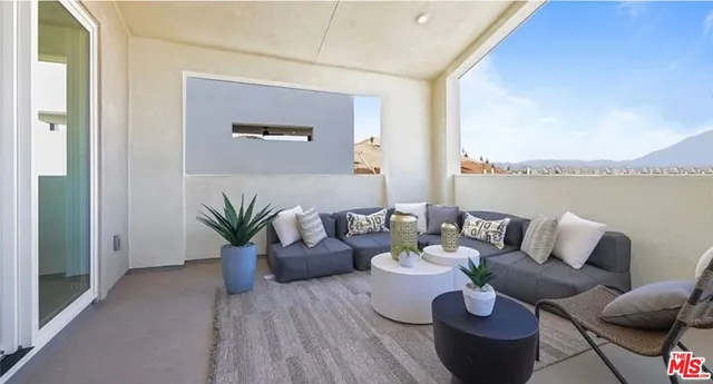 a view of a patio with swimming pool