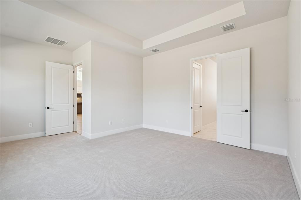 31479 Hayman Loop Wesley Chapel, FL 33545 - Photo 17 of 45 a view of an empty room