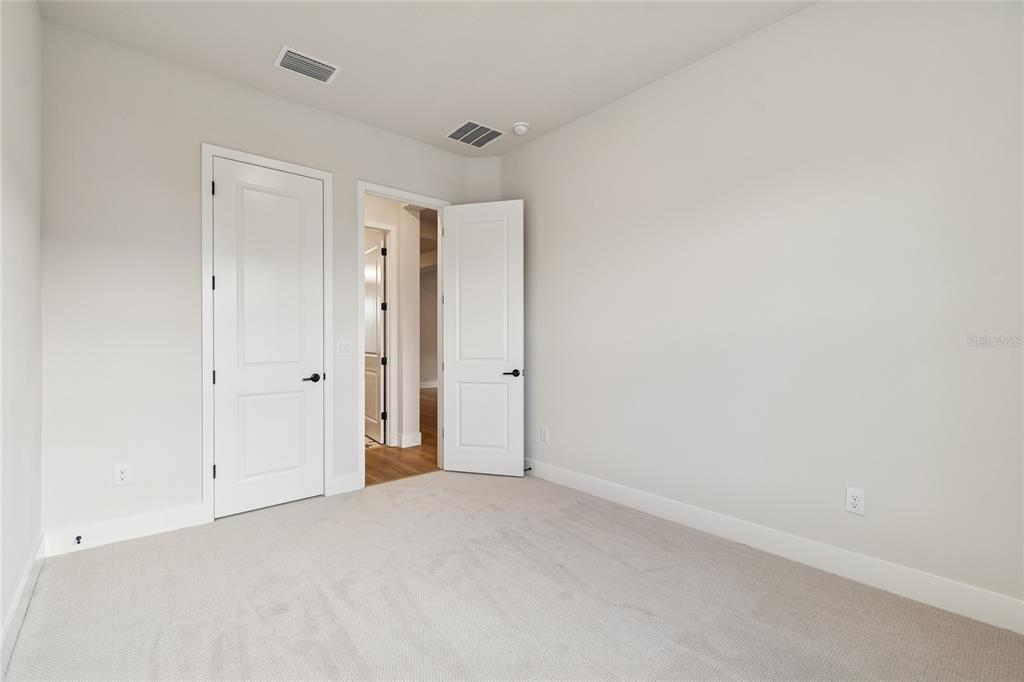 31479 Hayman Loop Wesley Chapel, FL 33545 - Photo 33 of 45 a view of an empty room