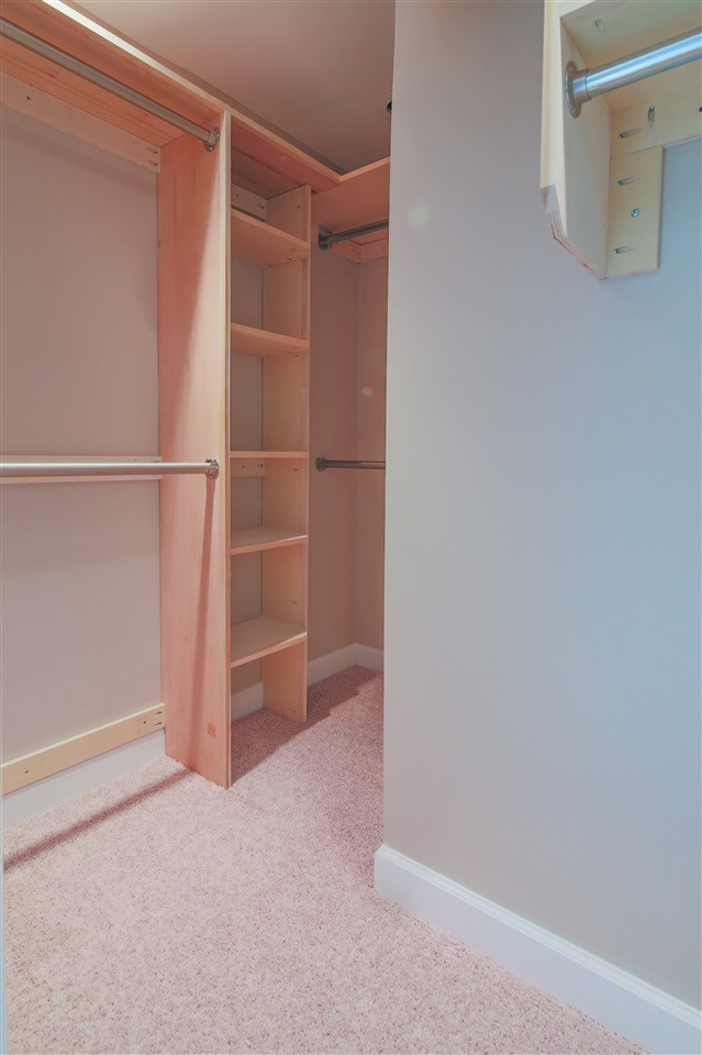 7705 Sandra Lane Raleigh, NC 27615 - Photo 10 of 12 Custom built walk in closet offer plenty of room for clothes and accessories. Master Walk in Closet