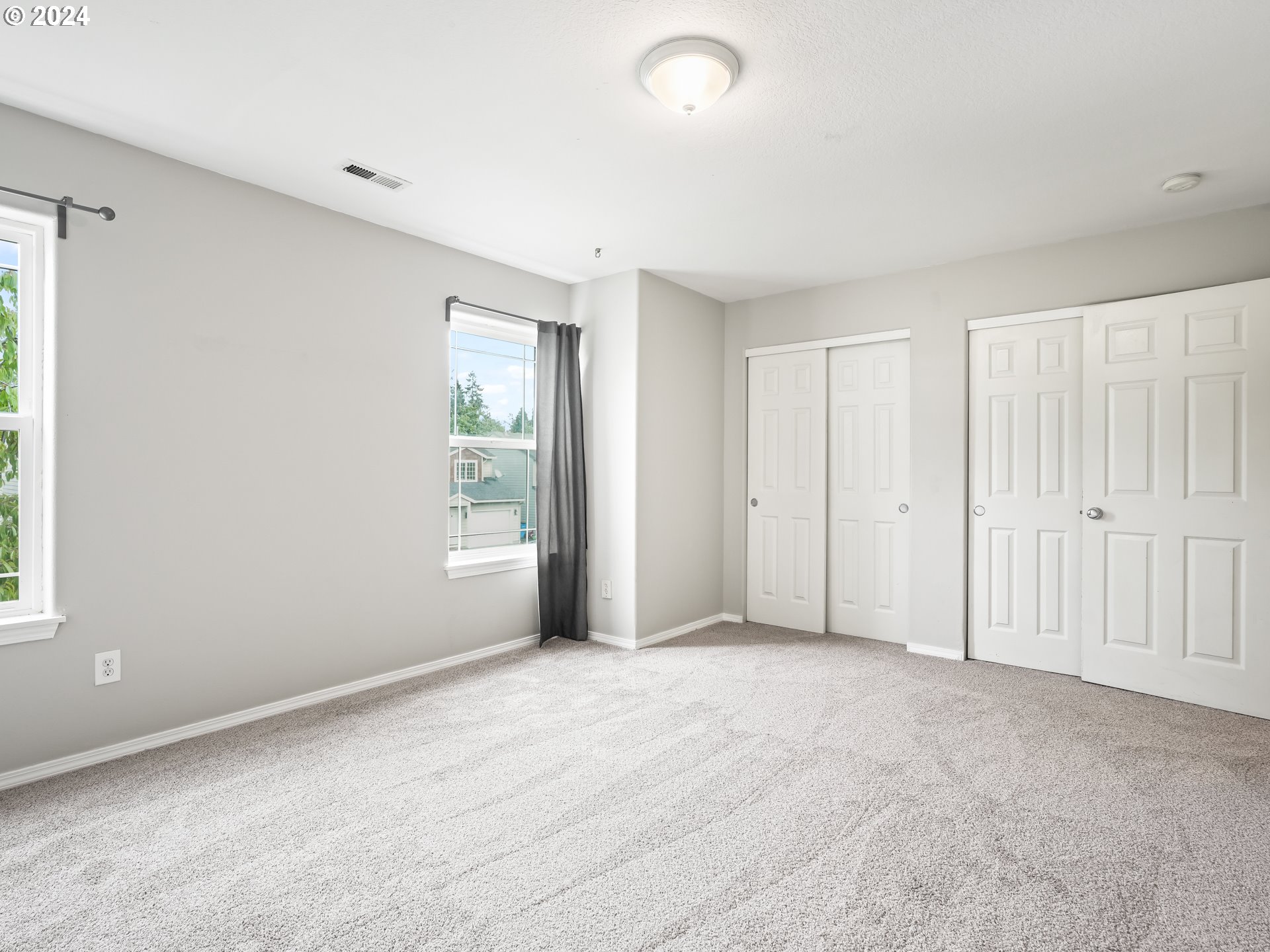 1209 Northeast 167th Street Ridgefield, WA 98642 - Photo 23 of 38 a view of an empty room with a window