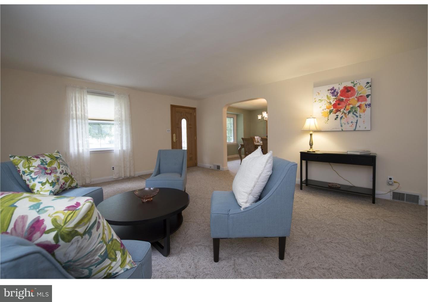 534 Kent Road Springfield, PA 19064 - Photo 2 of 24 a living room with furniture and a potted plant