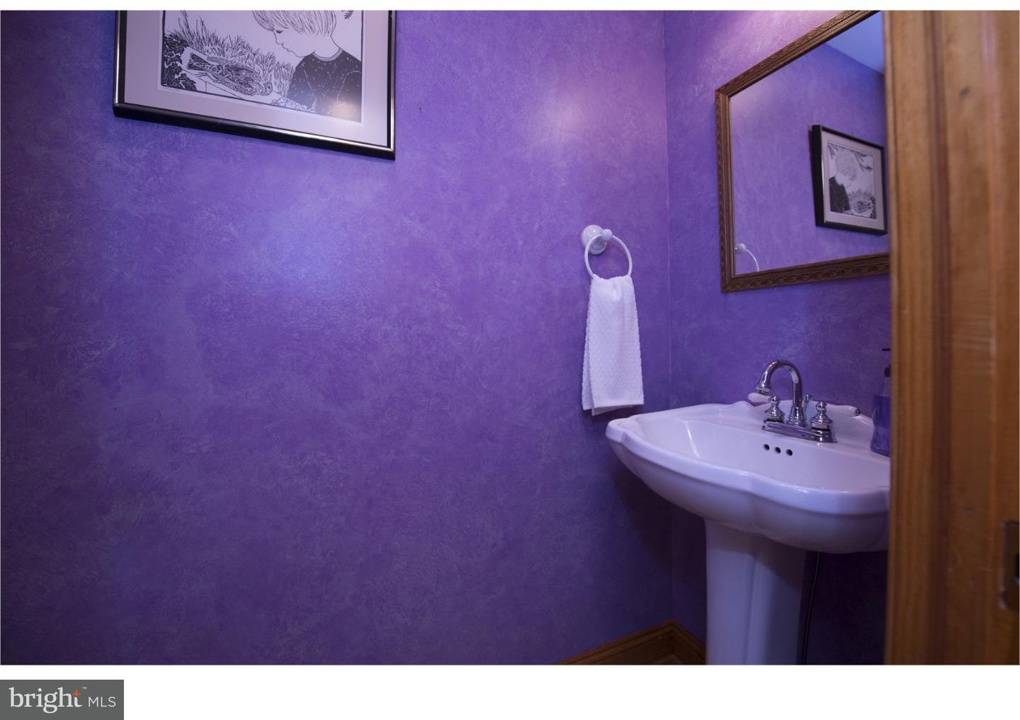 534 Kent Road Springfield, PA 19064 - Photo 18 of 24 a bathroom with a sink and a mirror