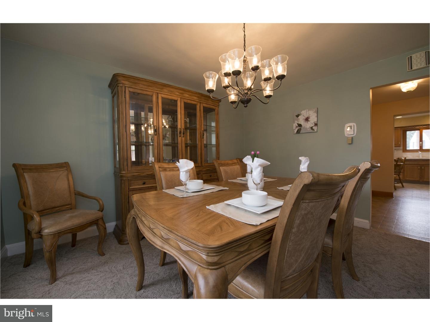 534 Kent Road Springfield, PA 19064 - Photo 6 of 24 a view of a dining room with furniture and wooden floor