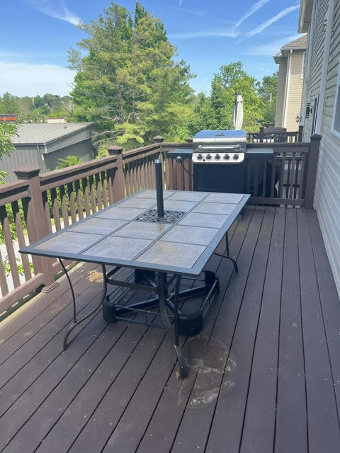 2212 Rising Hill Road Whitehall, PA 18052 - Photo 5 of 21 An inviting deck extends from the home, perfect for outdoor cooking and entertaining.