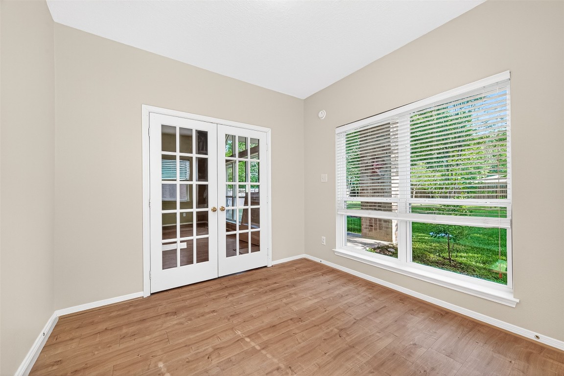1514 Melissa Drive Spring, TX 77386 - Photo 11 of 20 The 4th bedroom/guestroom/study has windows on two walls making bright and affording view of back yard.