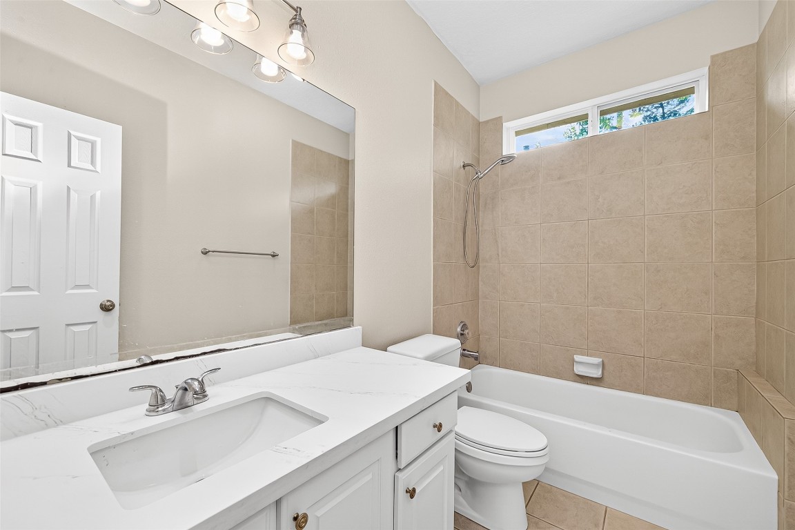 1514 Melissa Drive Spring, TX 77386 - Photo 12 of 20 The hall bath a new counter and new fixtures.