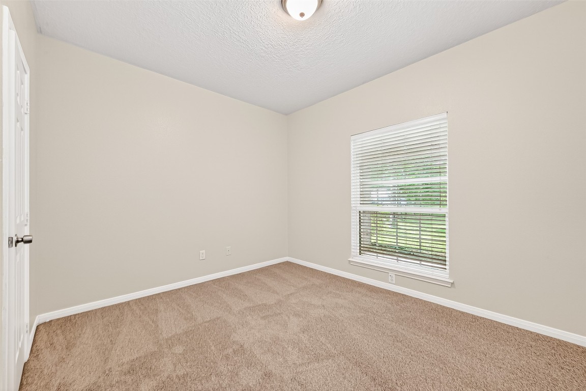 1514 Melissa Drive Spring, TX 77386 - Photo 13 of 20 All of the carpet in the home is new! That includes the secondary bedrooms