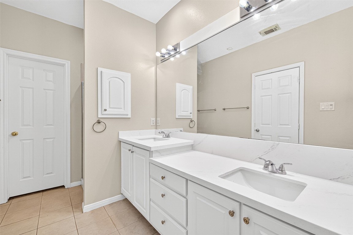 1514 Melissa Drive Spring, TX 77386 - Photo 17 of 20 The master bath has new counters, sinks and fixtures.