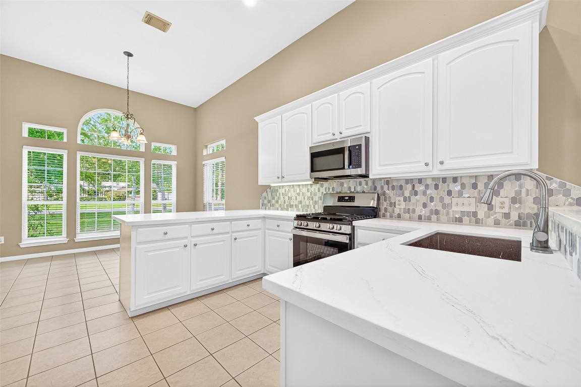 1514 Melissa Drive Spring, TX 77386 - Photo 7 of 20 The kitchen and breakfast nook also have high ceilings and recently got a facelift.