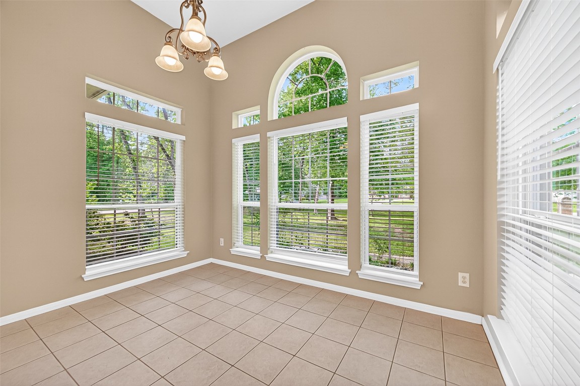 1514 Melissa Drive Spring, TX 77386 - Photo 9 of 20 This bright and airy breakfast nook offers 180 degree views of the front yard.