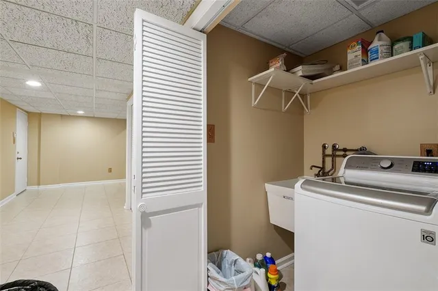 a view of a hallway with stairs