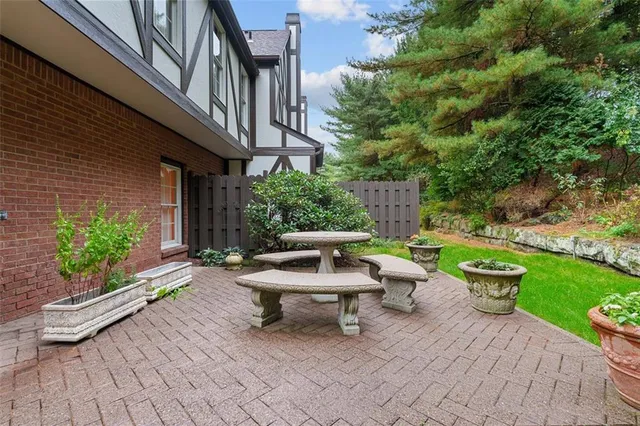 a view of an house with backyard space and garden