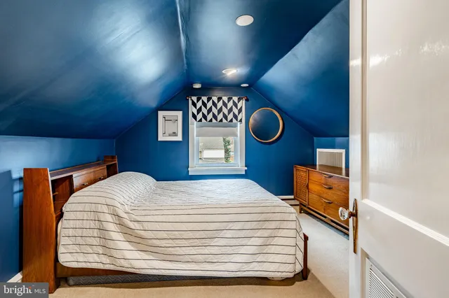 an empty room with furniture and cabinet