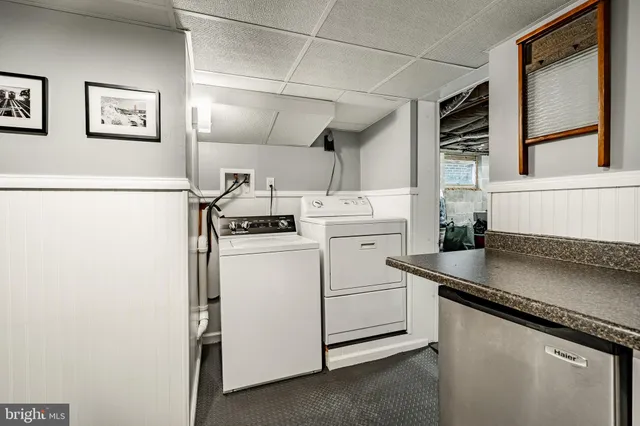 a utility room with dryer and washer